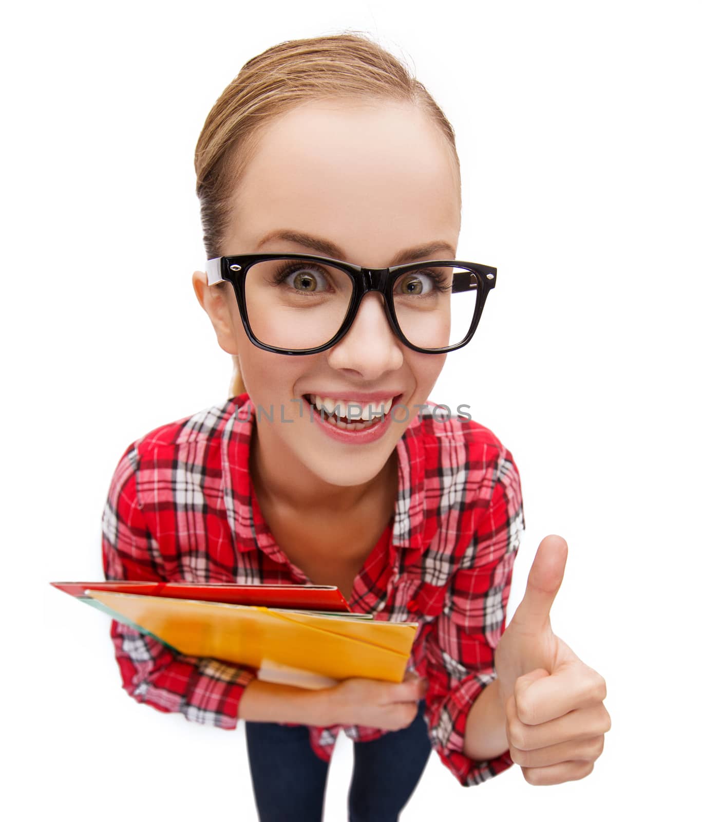 education and gesture concept - smiling student in black eyeglasses with folders showing thumbs up