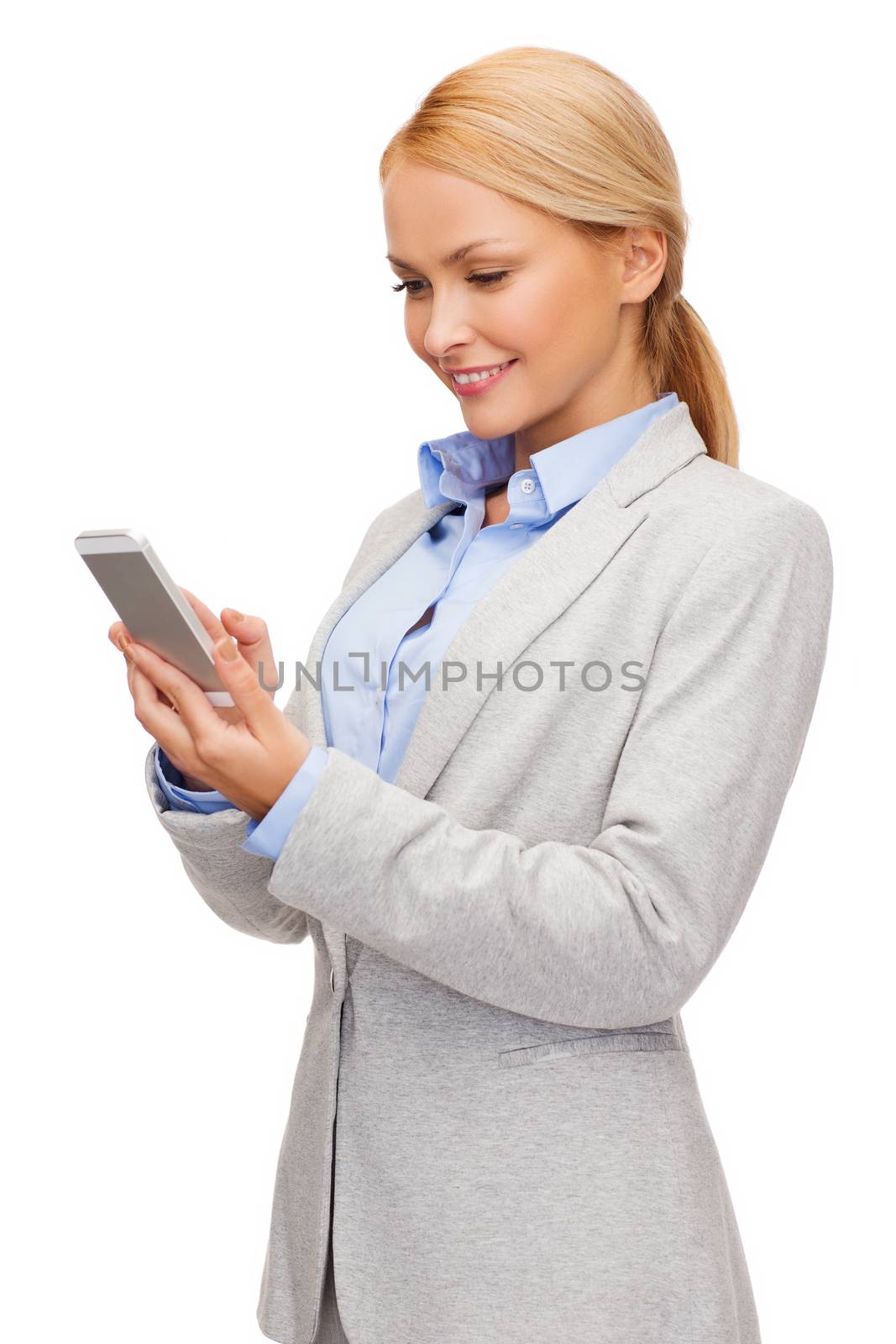 business, internet and technology concept - smiling woman looking at smartphone