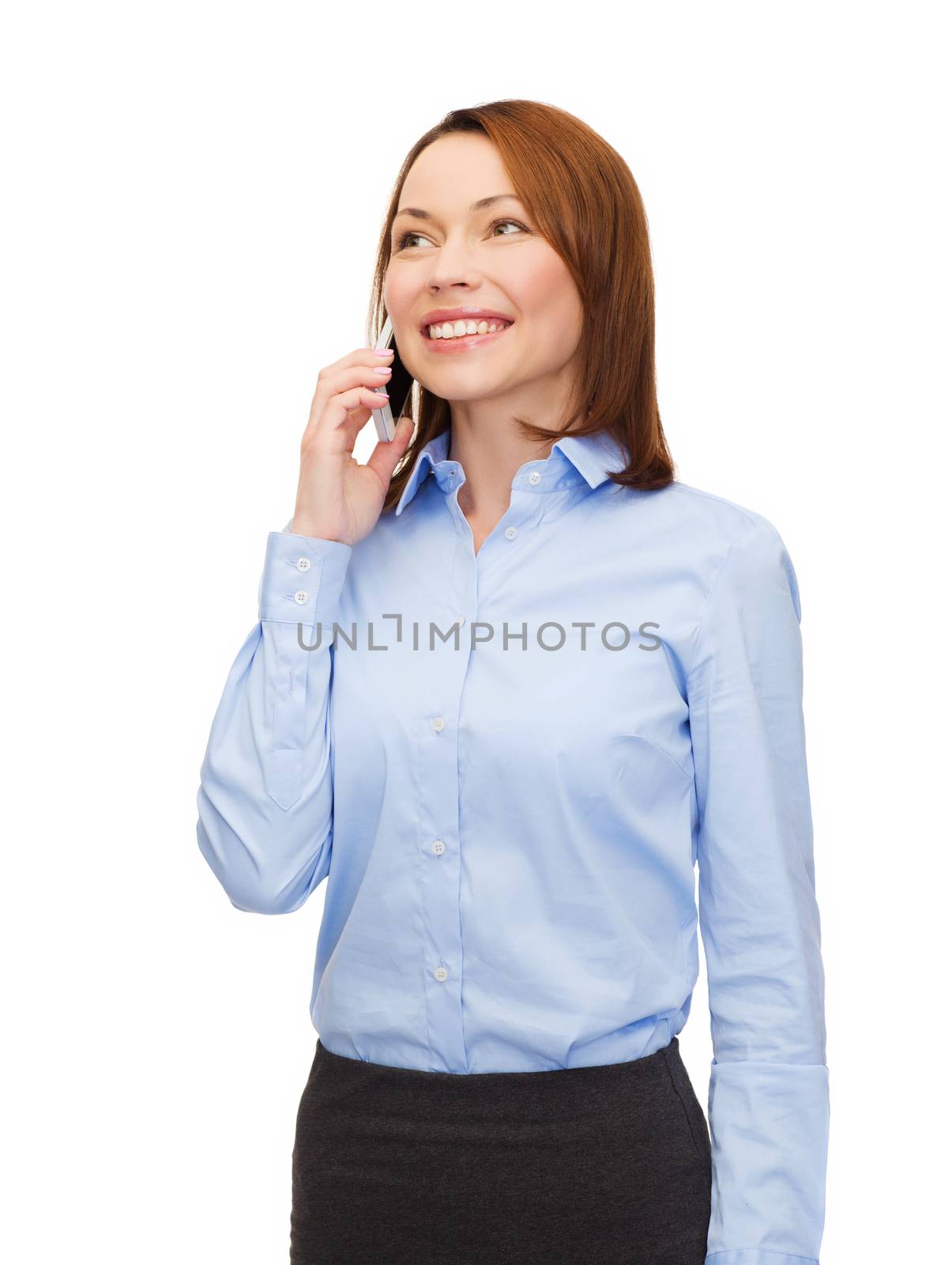 young smiling businesswoman with smartphone by dolgachov