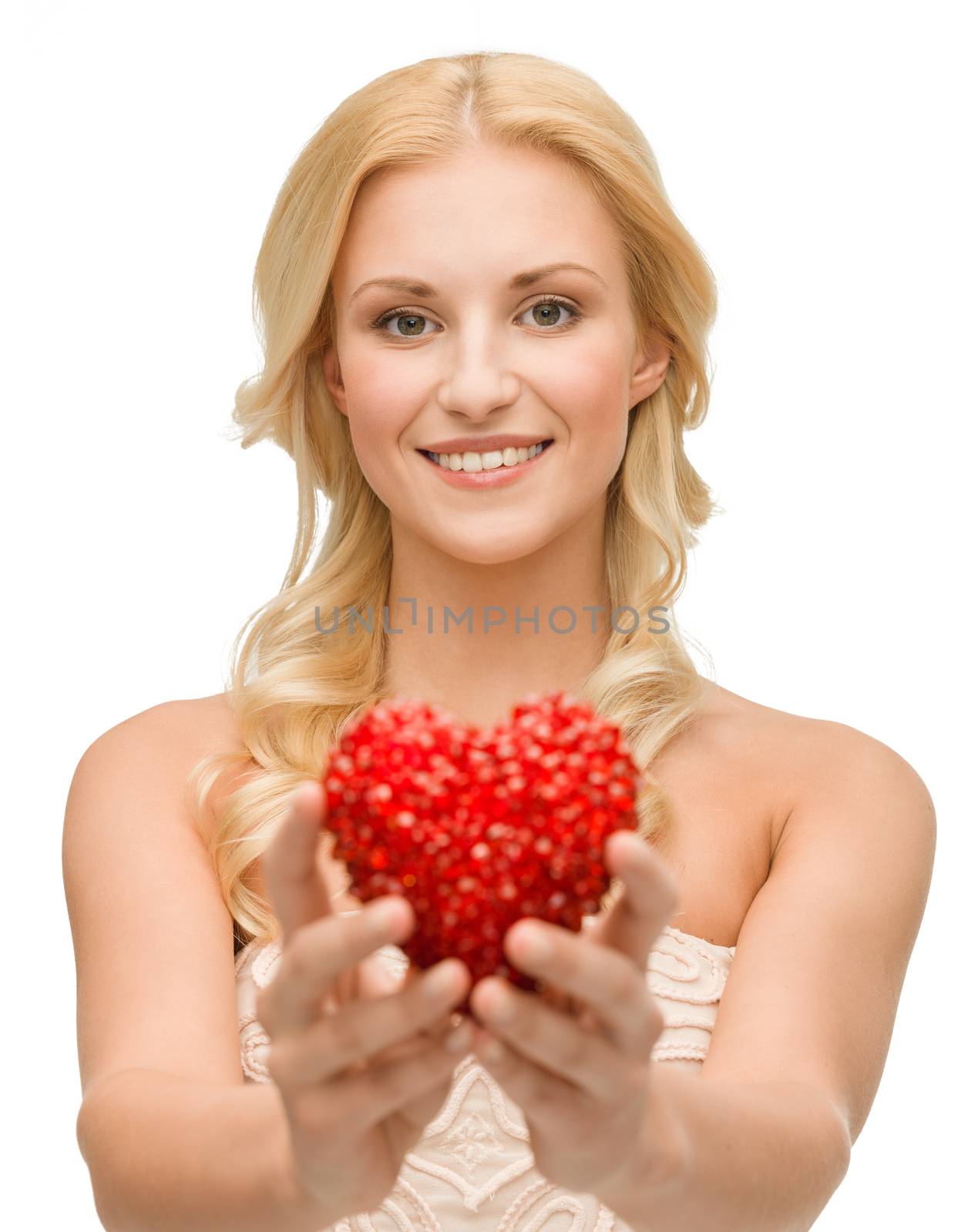 smiling woman giving small red heart by dolgachov