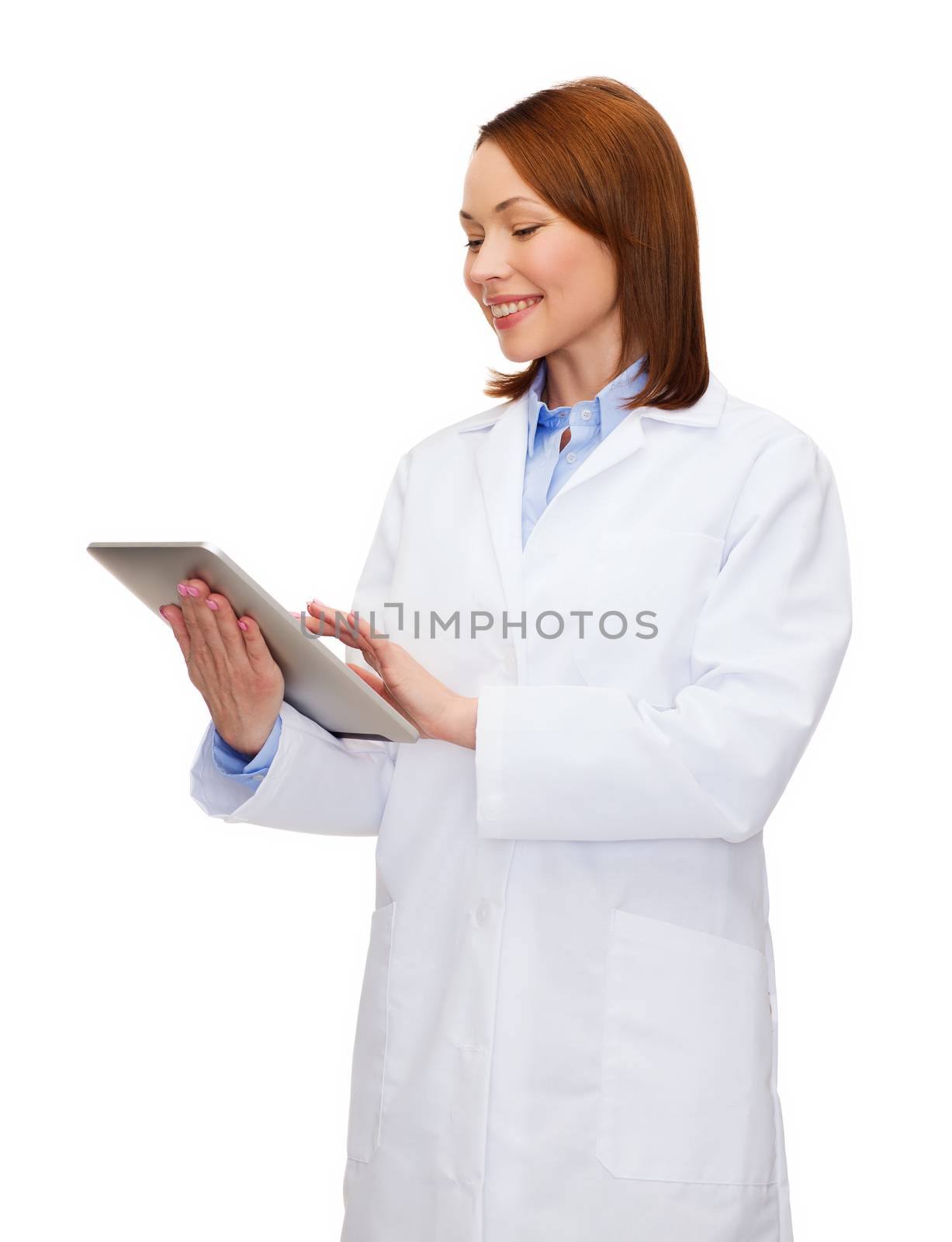 smiling female doctor and tablet pc computer by dolgachov