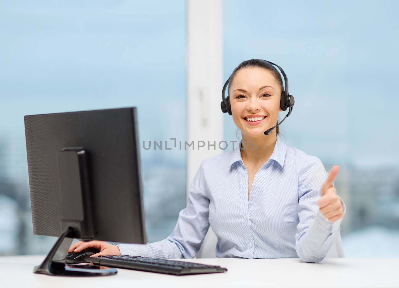 business, communication and call center concept - friendly female helpline operator with headphones showing thumbs up