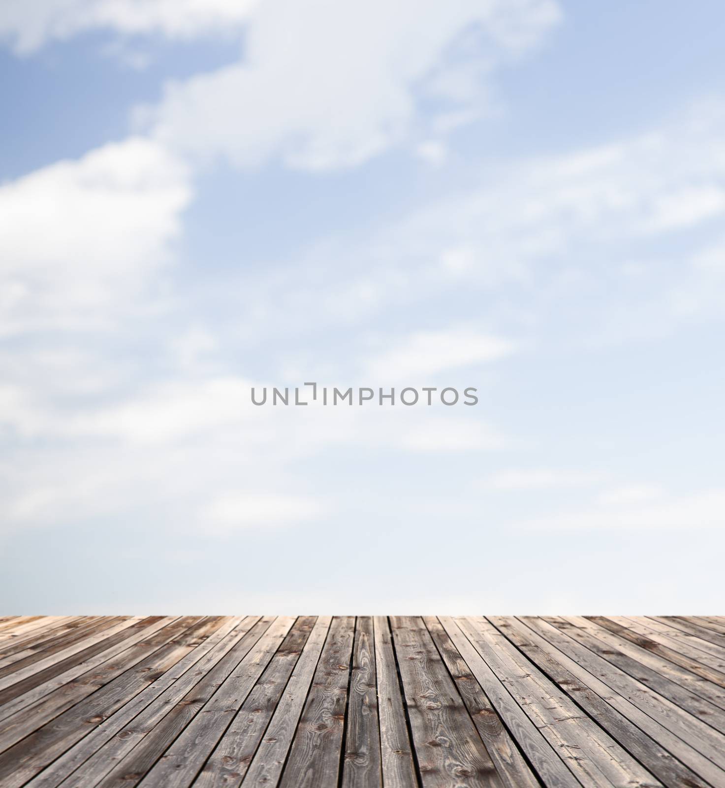 background and texture concept - wooden floor and blue sky