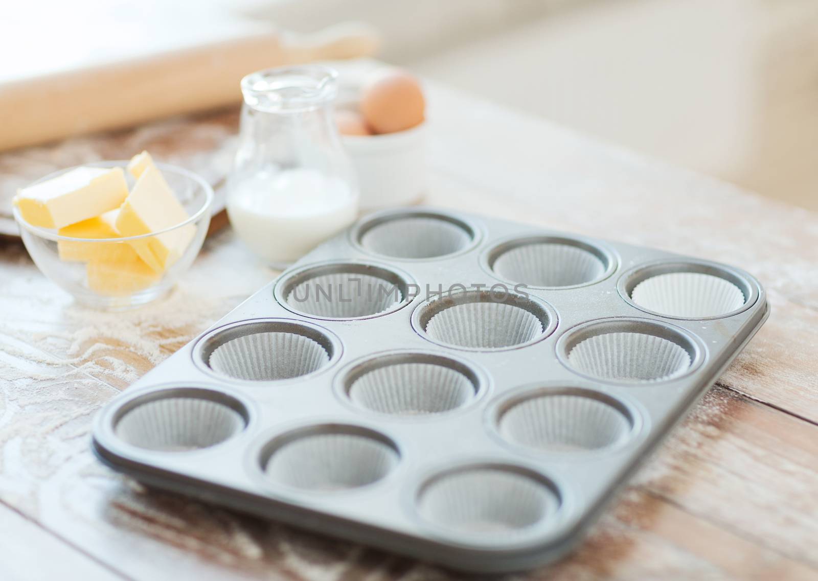 close up of empty muffins molds by dolgachov