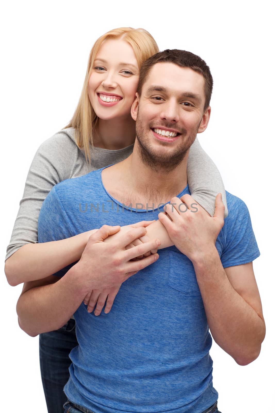 love and family concept - smiling couple hugging