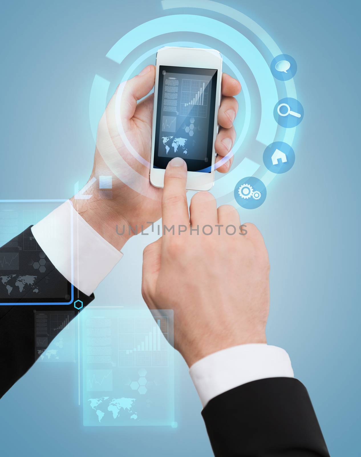 businessman touching screen of smartphone by dolgachov