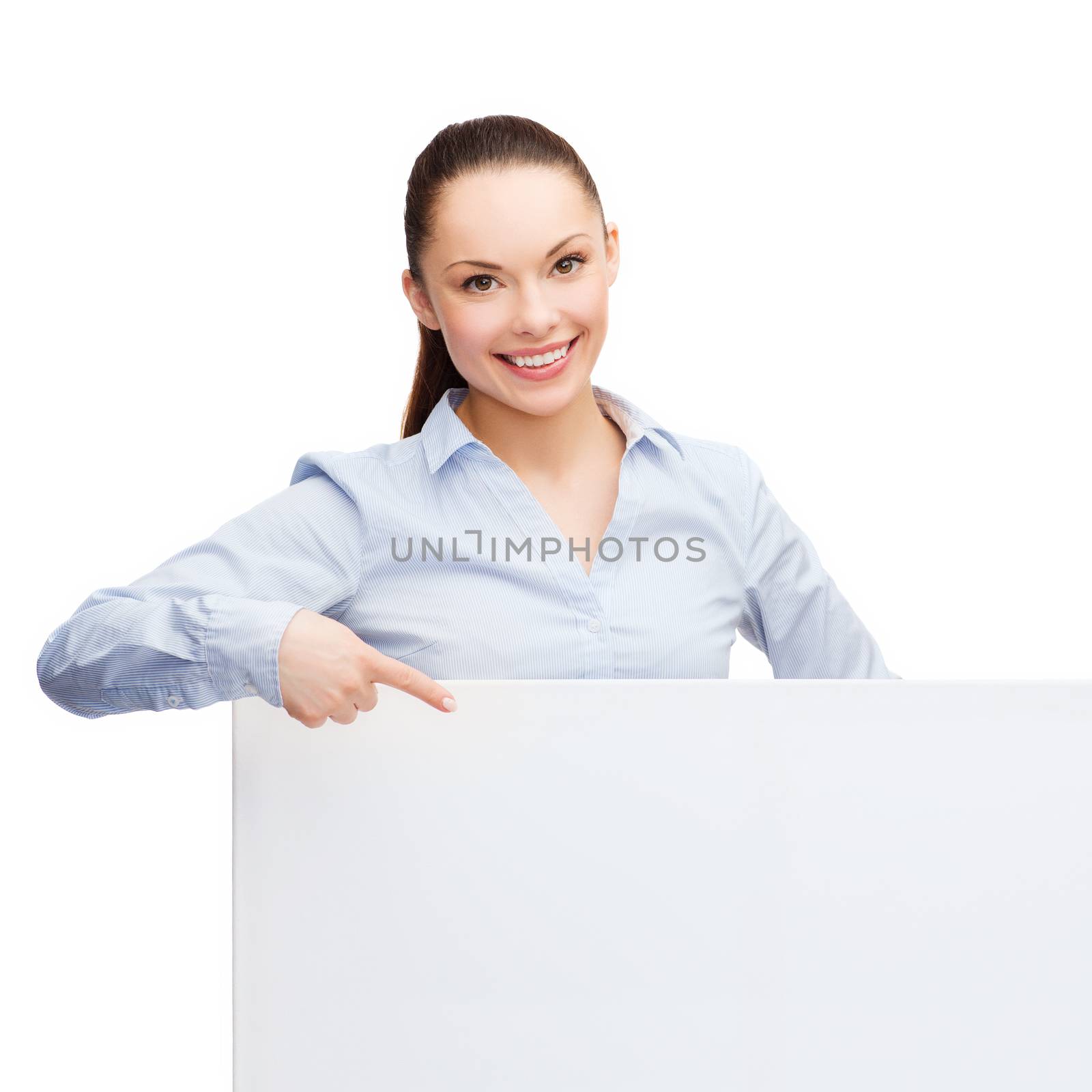 businesswoman pointing finger to white blank board by dolgachov