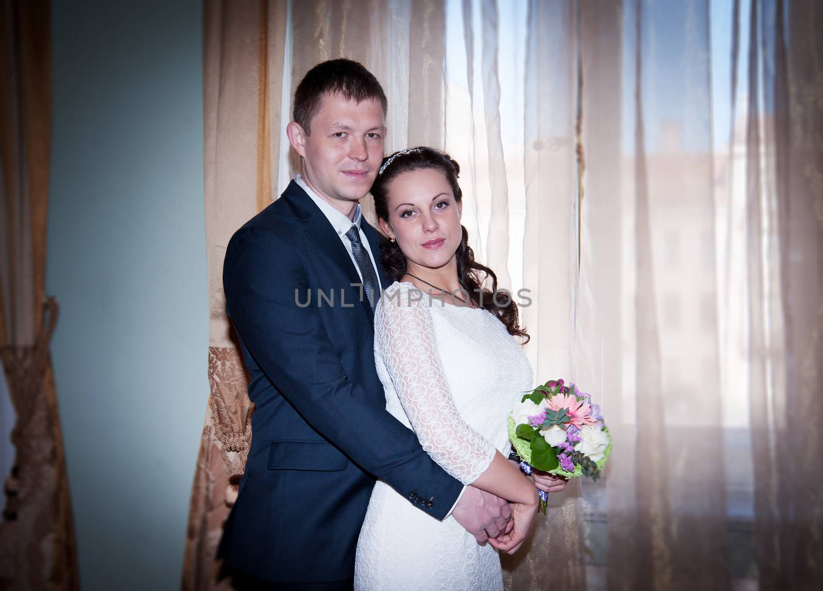 bride and groom in the wedding Palace