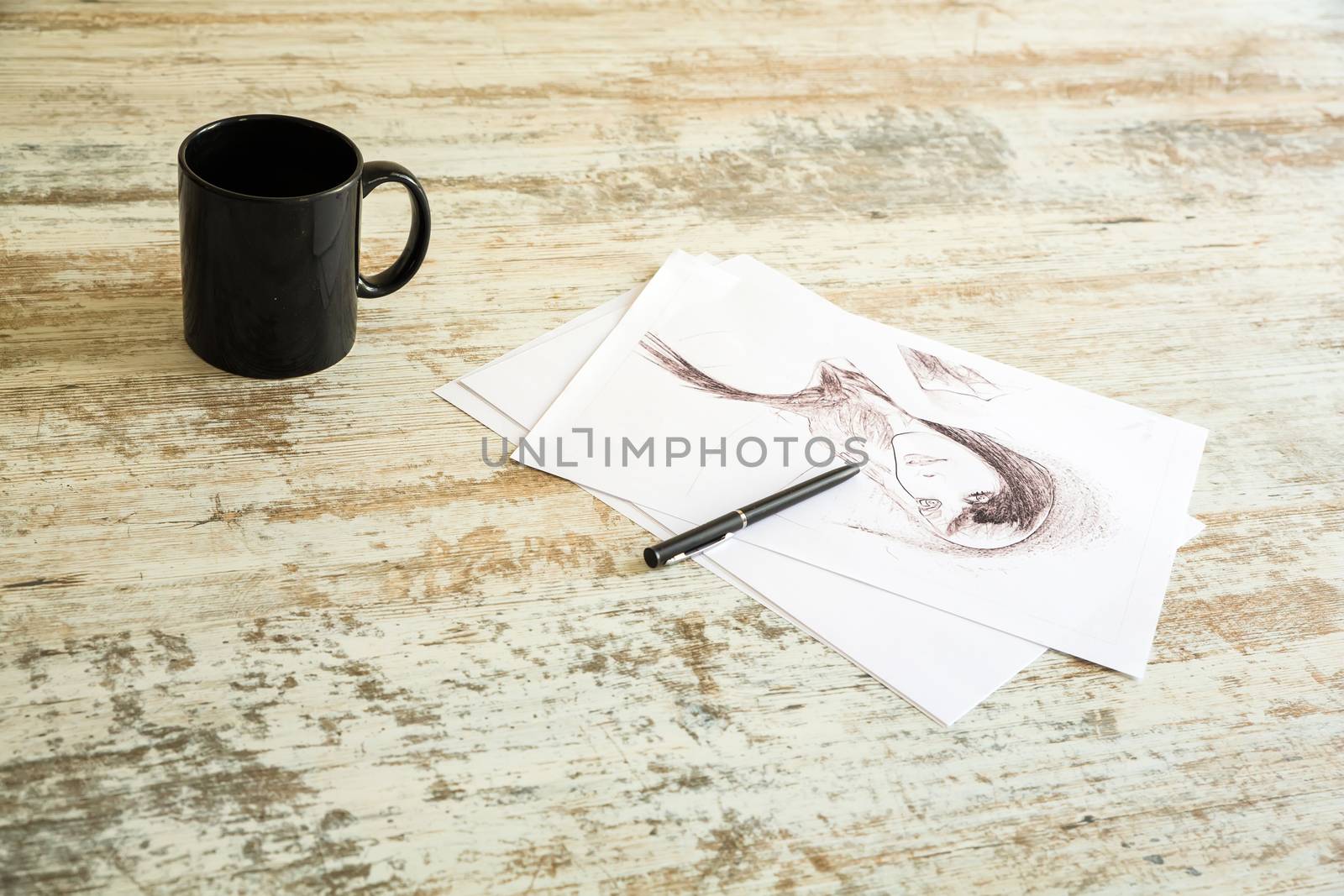 Drawing a sketch on the Table.