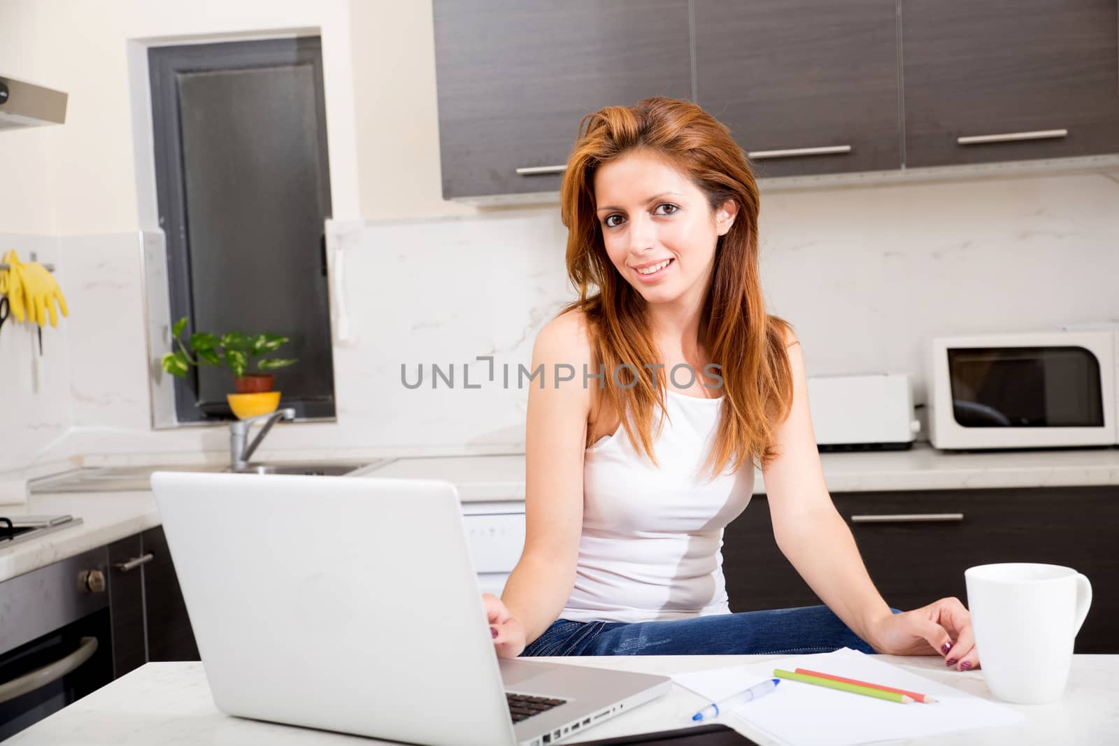 Brunette girl working in kitchen by Spectral