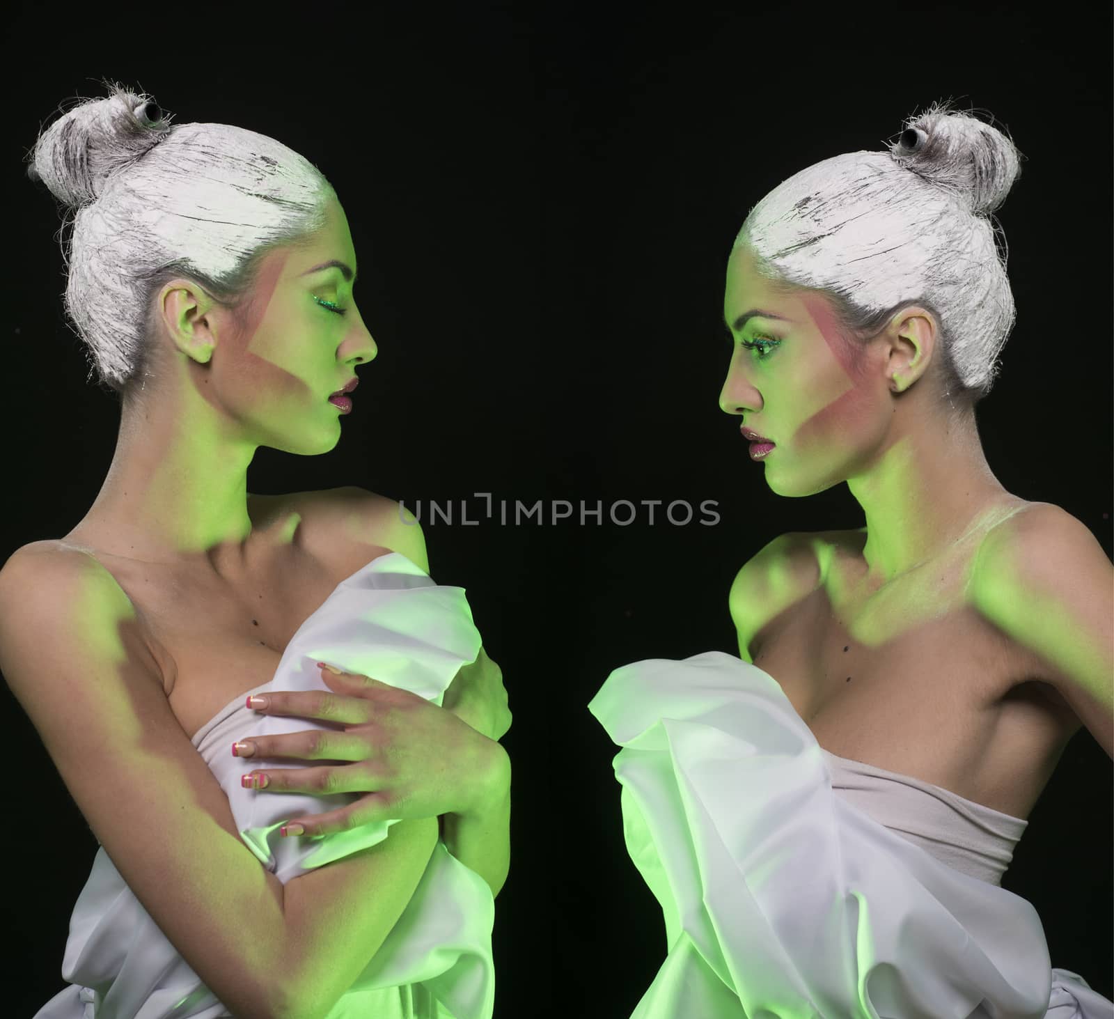 Artistic makeup model with white dress & hair