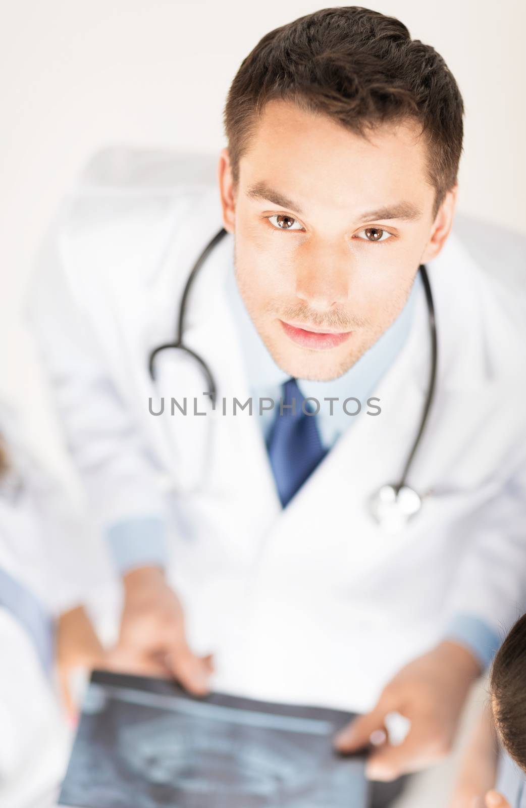 bright picture of male doctor with x-ray