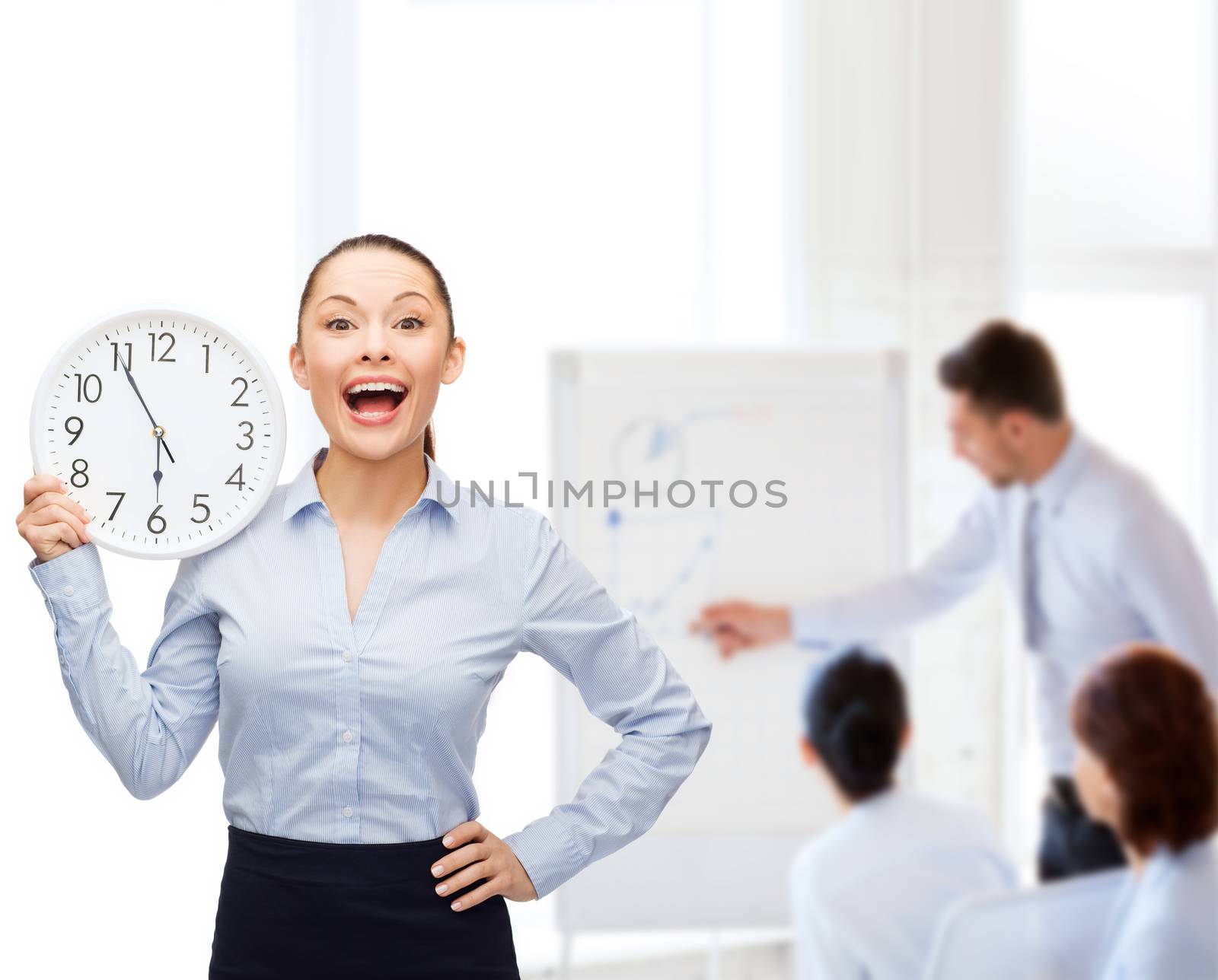 attractive businesswoman with wall clock by dolgachov