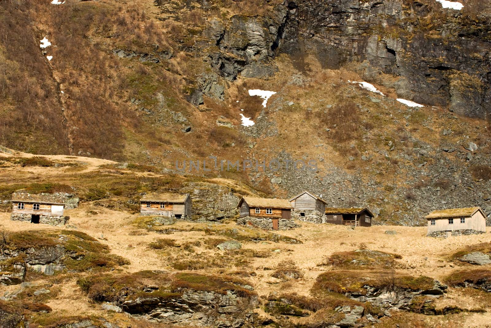 Old shielings in the mountains, where the sheep and cattle were kept in the summer time.