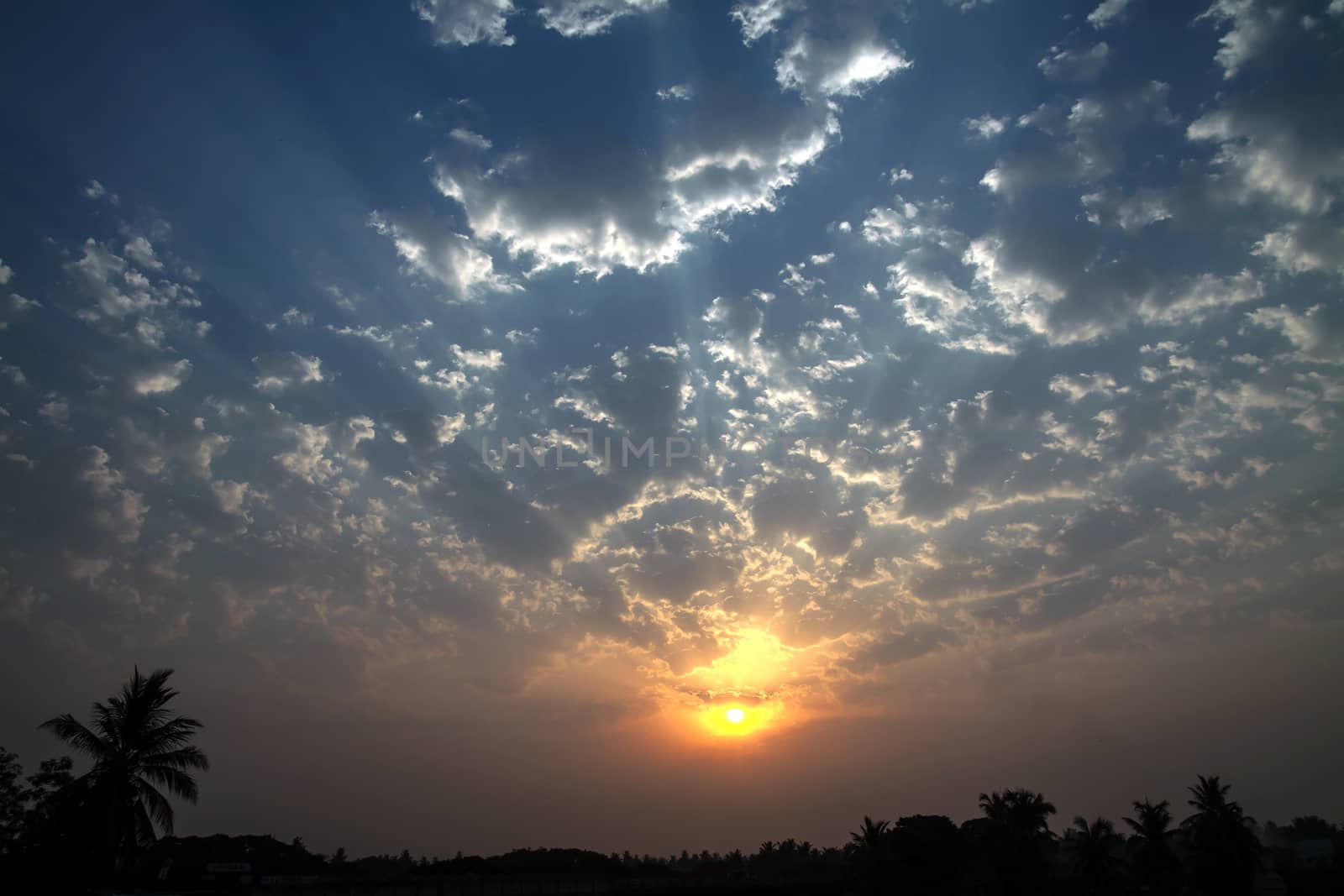 Dramatic Dawn Sun Skyscape Edge Lighted Cumulus Clouds by giddavr