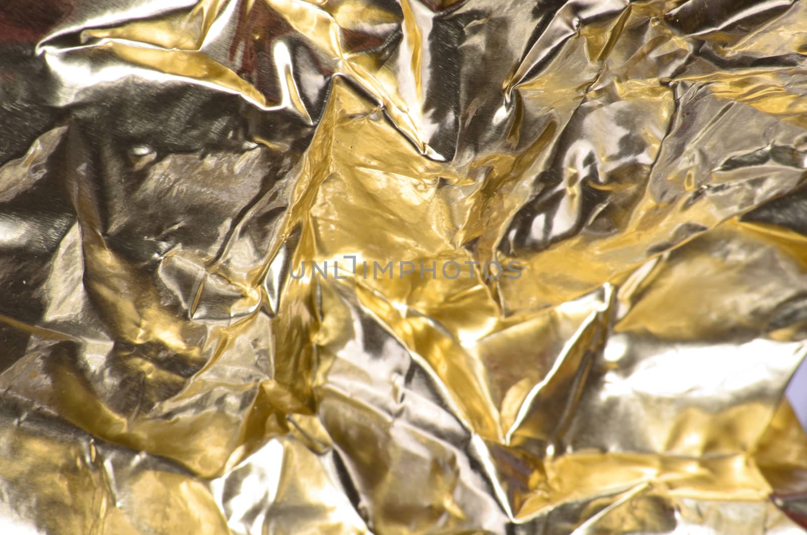 crumpled golden foil by sarkao