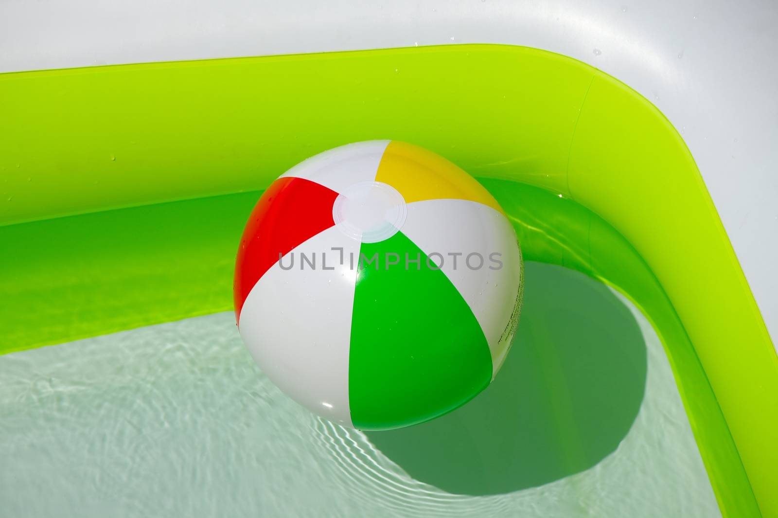 Rubber ball in a swimming pool