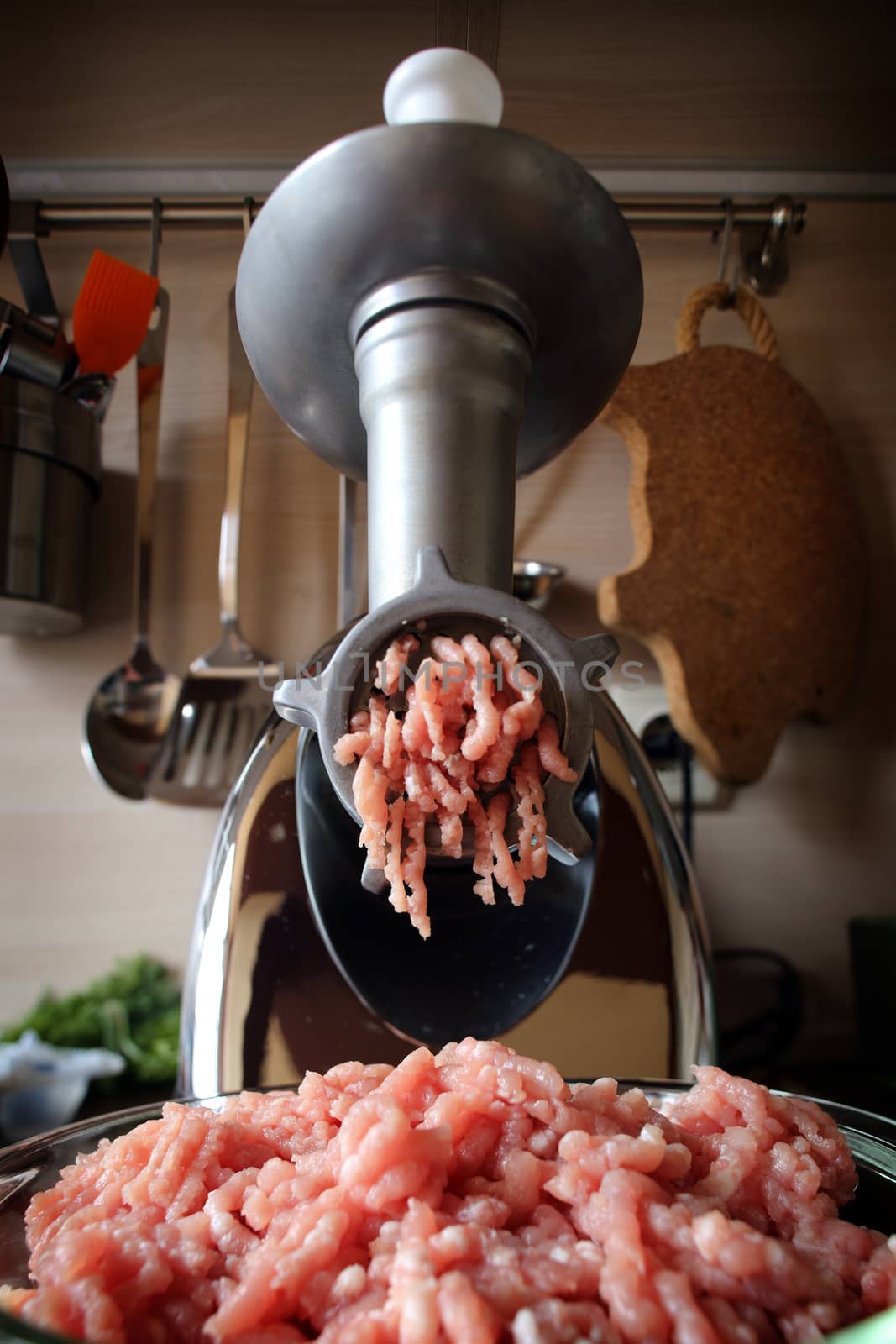 Meat grinder close up, preparation of forcemeat