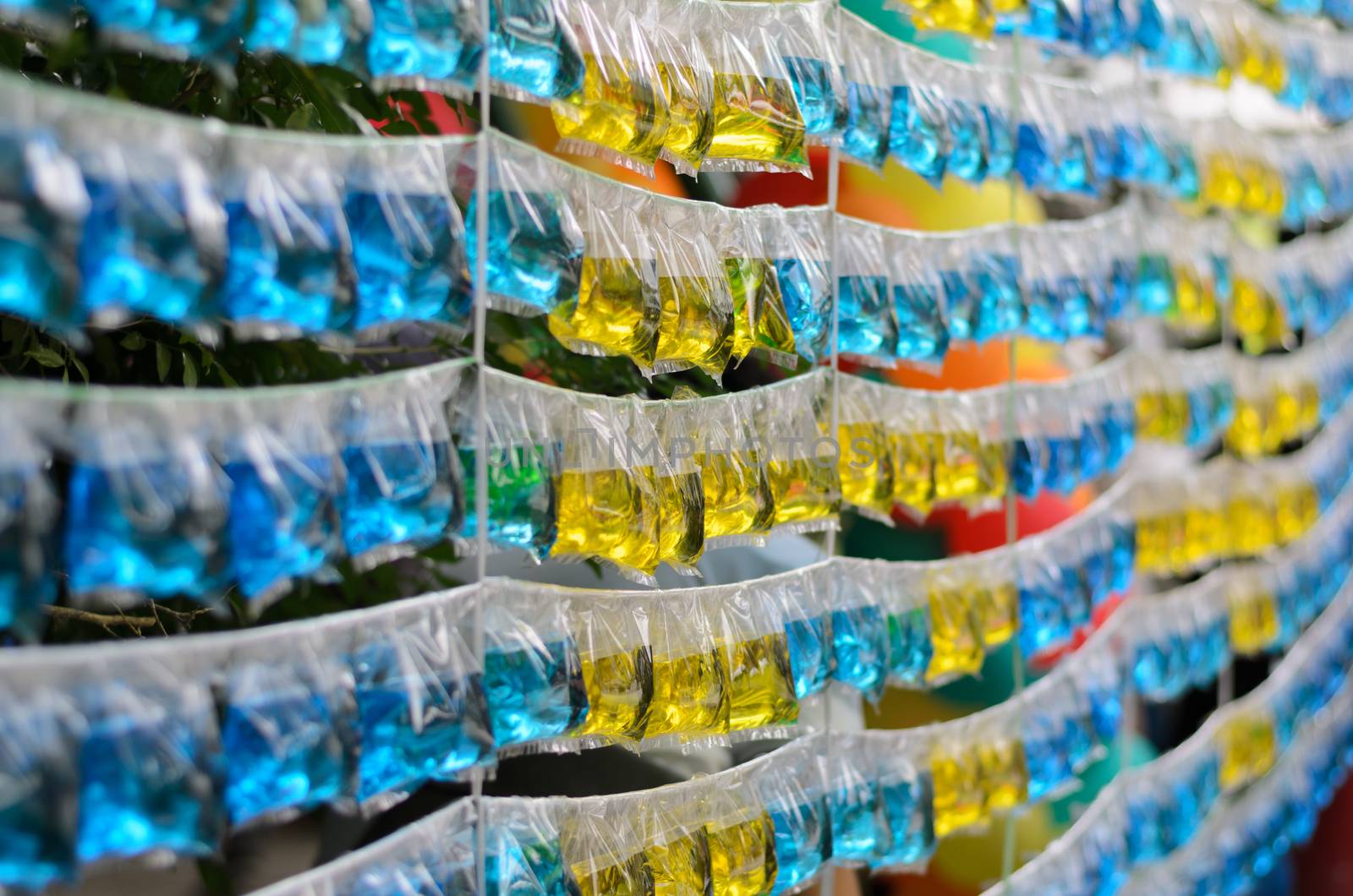 Yellow and blue colorful water in plastic bag