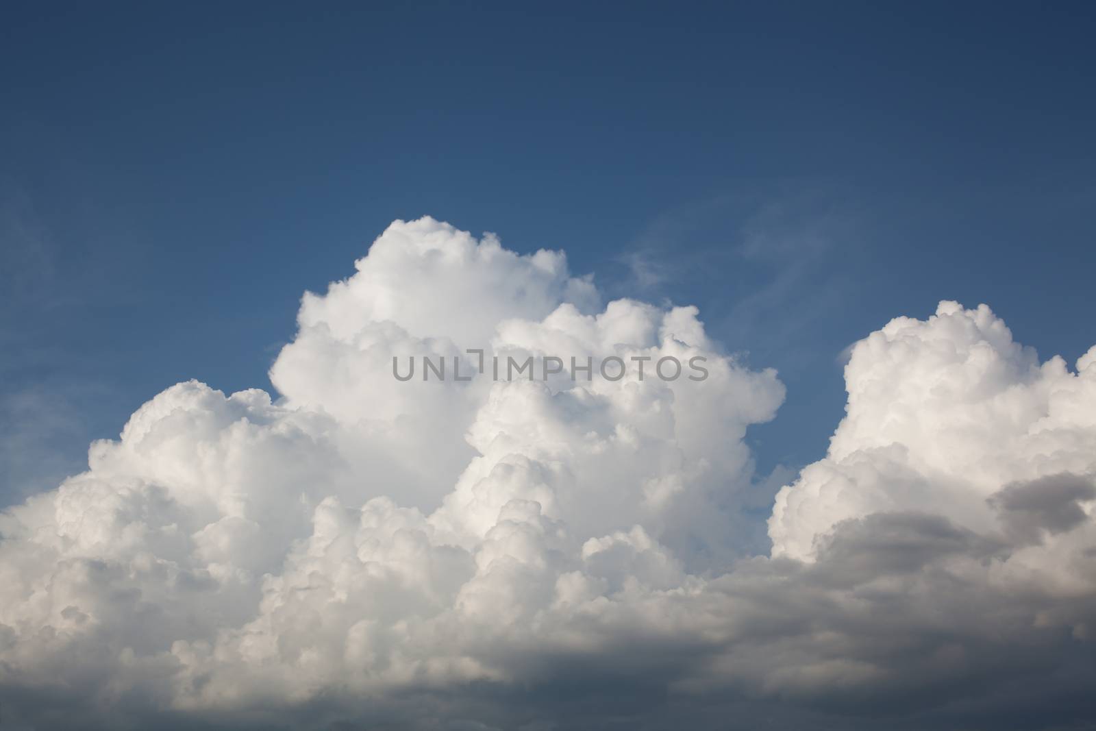 White easy clouds in the blue sky