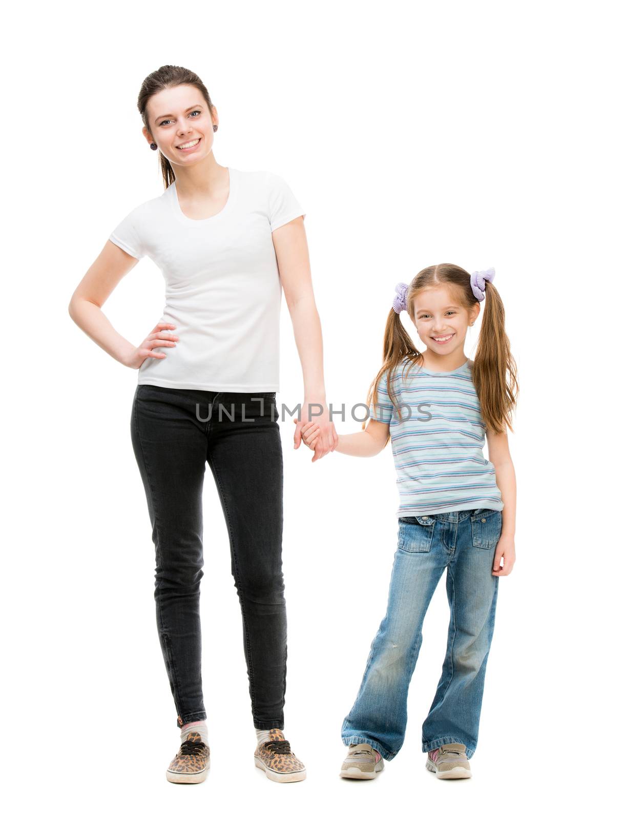 two sisters holding hands isolated on a white background