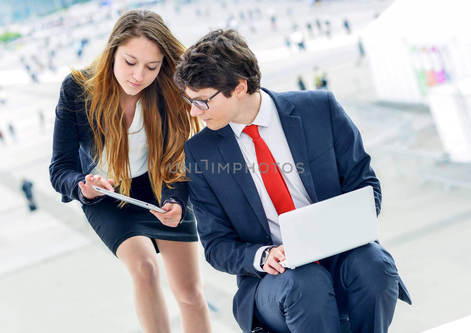 Junior executives dynamics working outside of their office by pixinoo