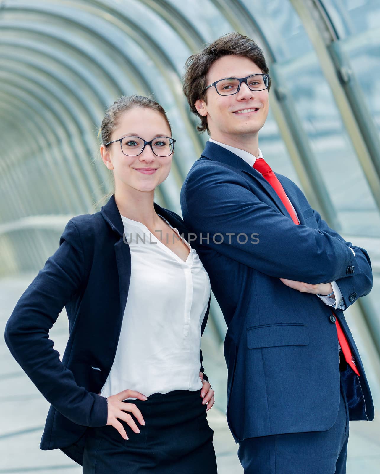 expressive portrait Junior executives of company crossed arms by pixinoo