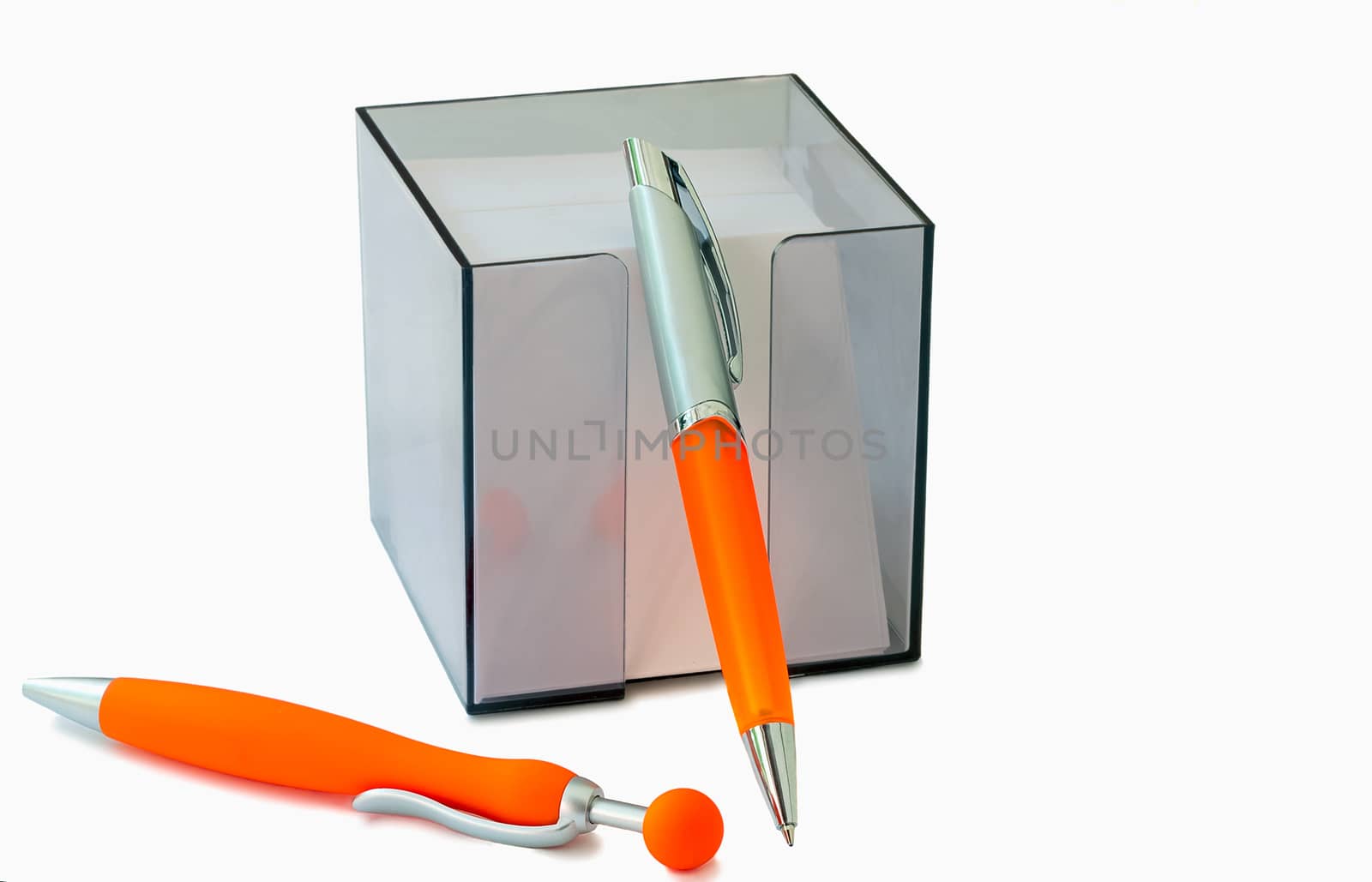 Two handles of bright orange color for the letter and scratch paper in the container. Are presented on a white background.