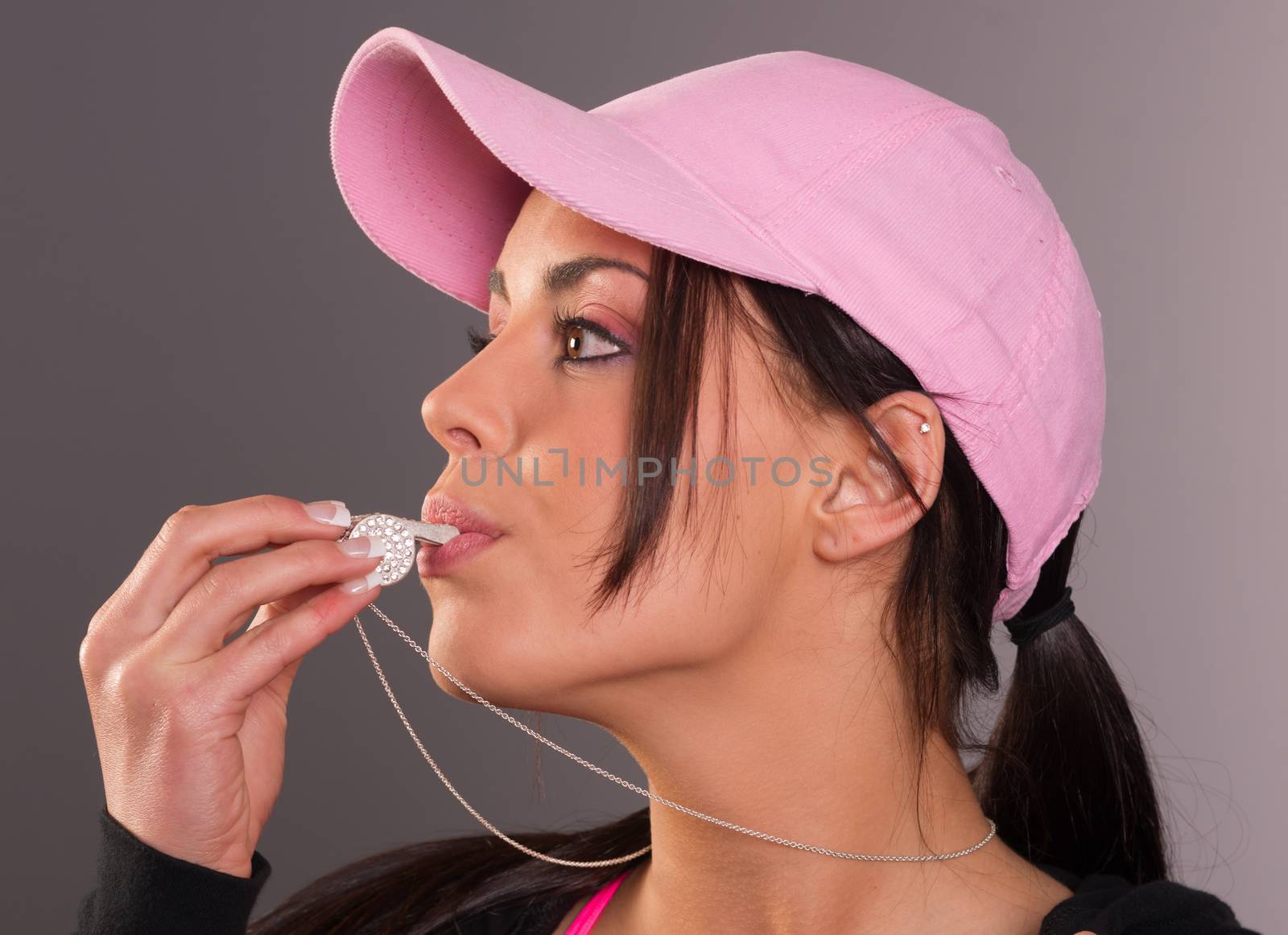 Attractive Brunette Female Blows Whistle Pink Ball Cap Whistlebl by ChrisBoswell