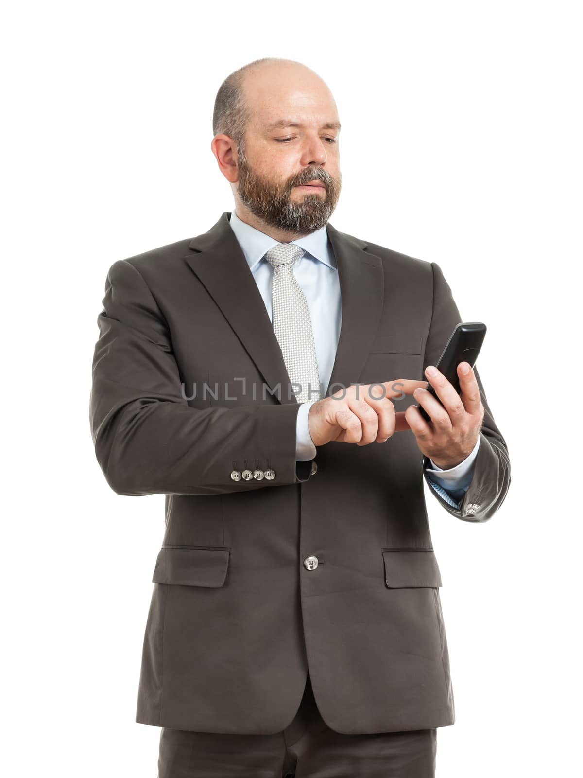 An image of a handsome business man at the phone