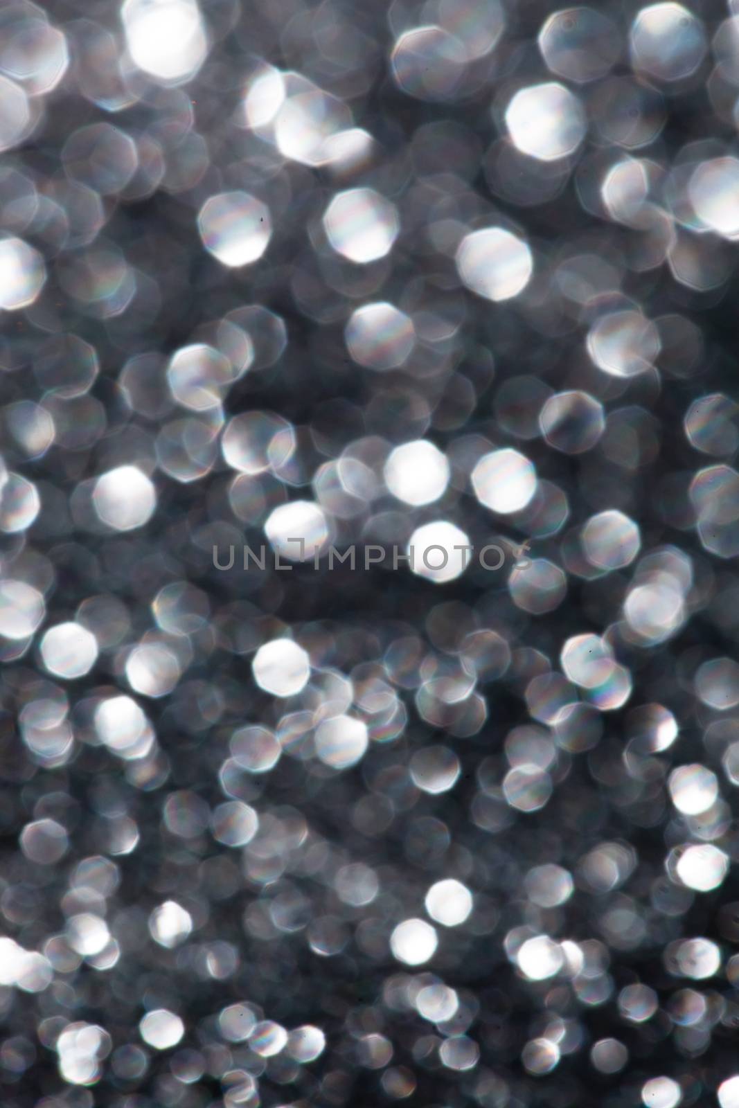Abstract silver glitter background by shebeko