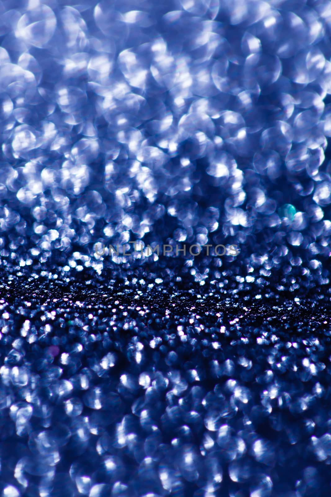 Defocused abstract blue lights background by shebeko