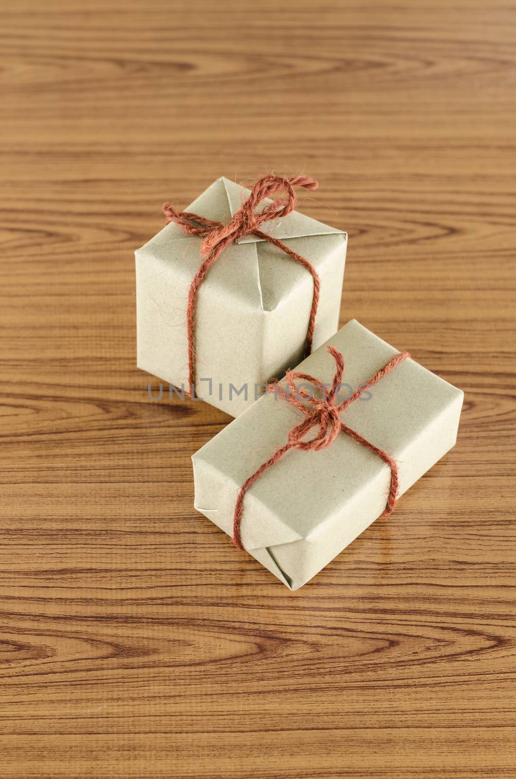 brown gift box on wooden background
