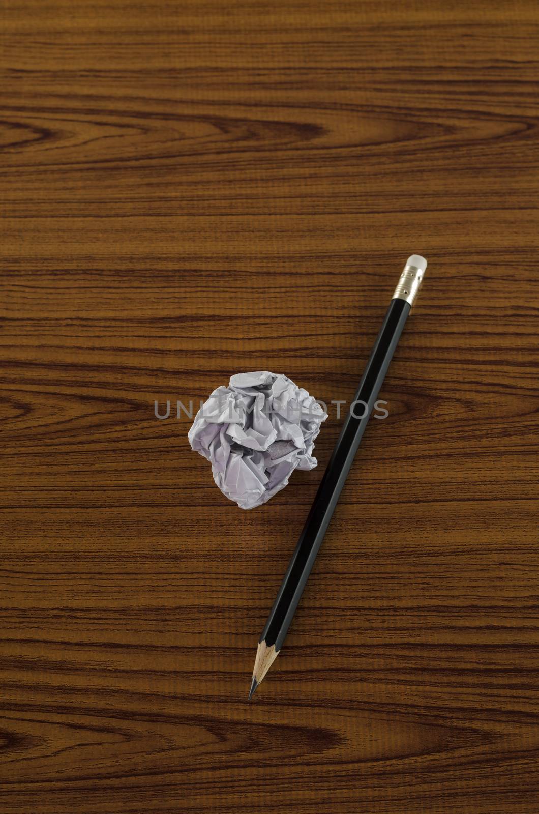 crumpled paper and pencil  by ammza12