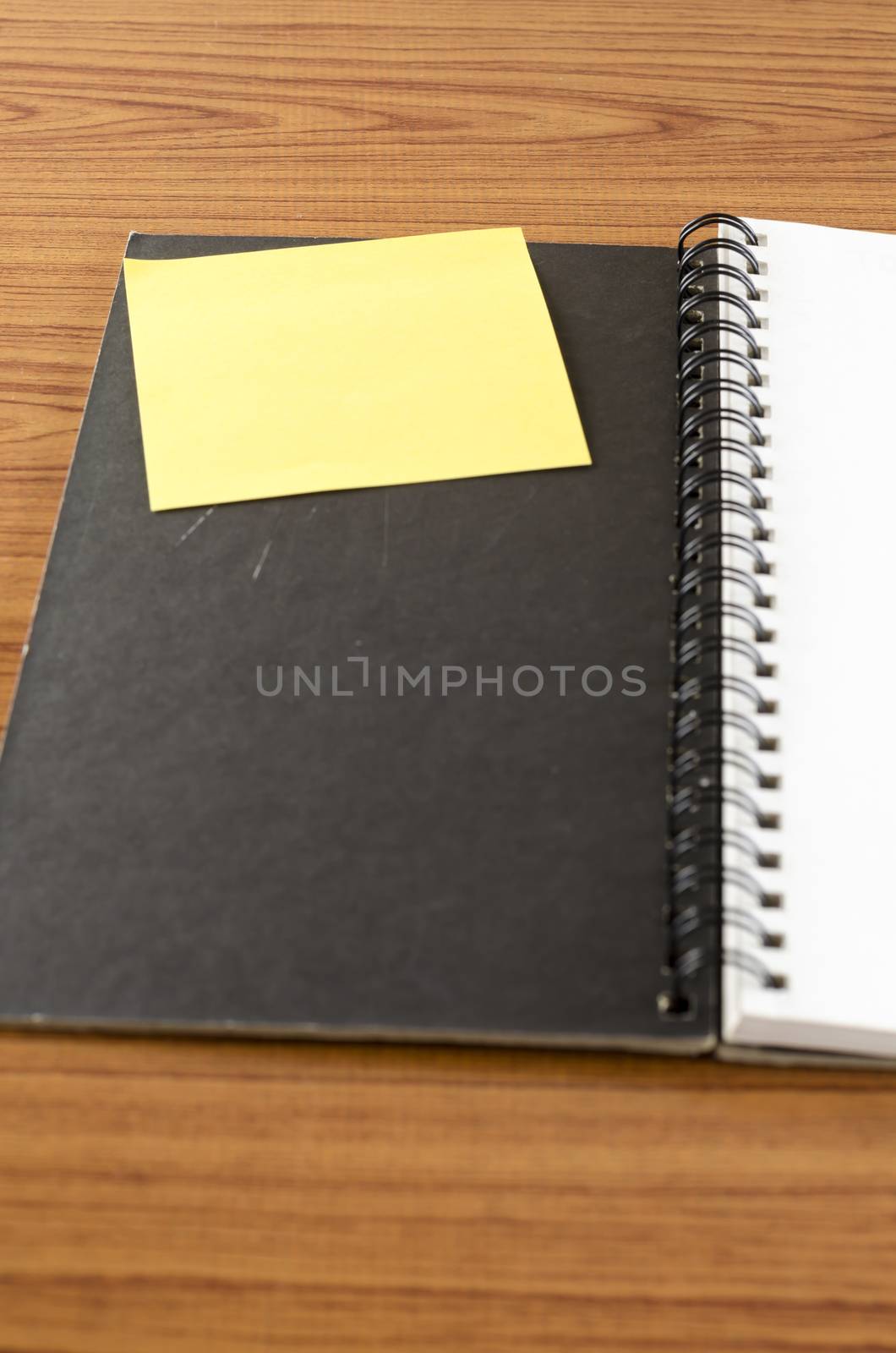 open notebook with post it by ammza12