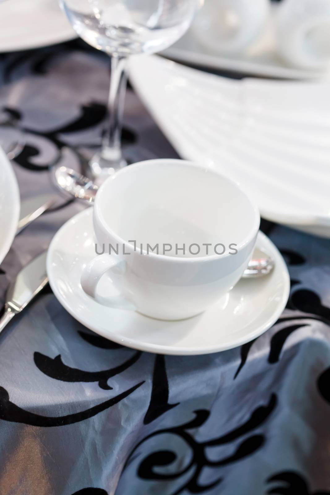 
Ceramic tableware on the table by shebeko