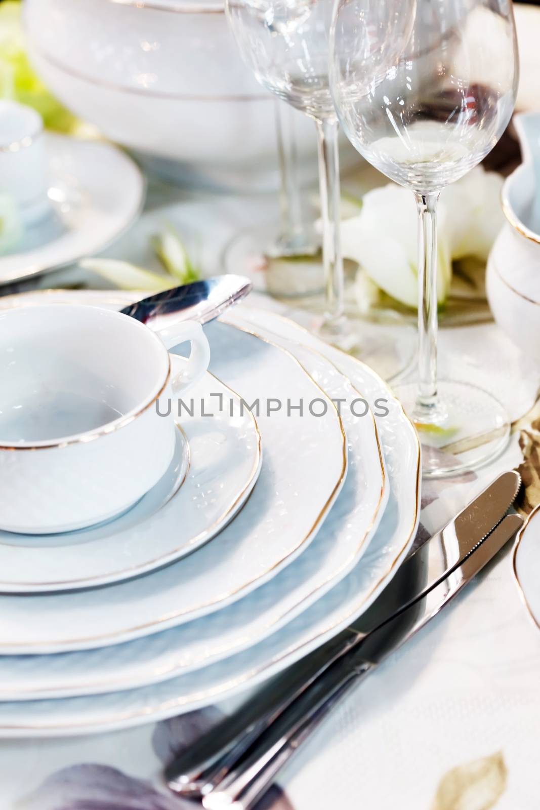 
Ceramic tableware on the table by shebeko