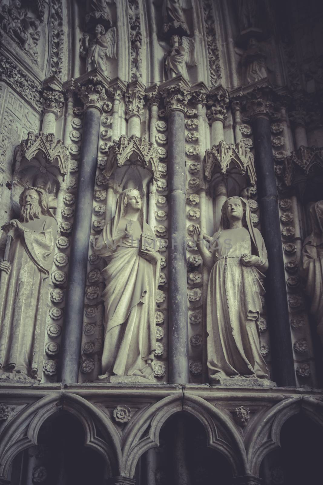 side entrance of the Cathedral of Toledo, arc with religious rel by FernandoCortes