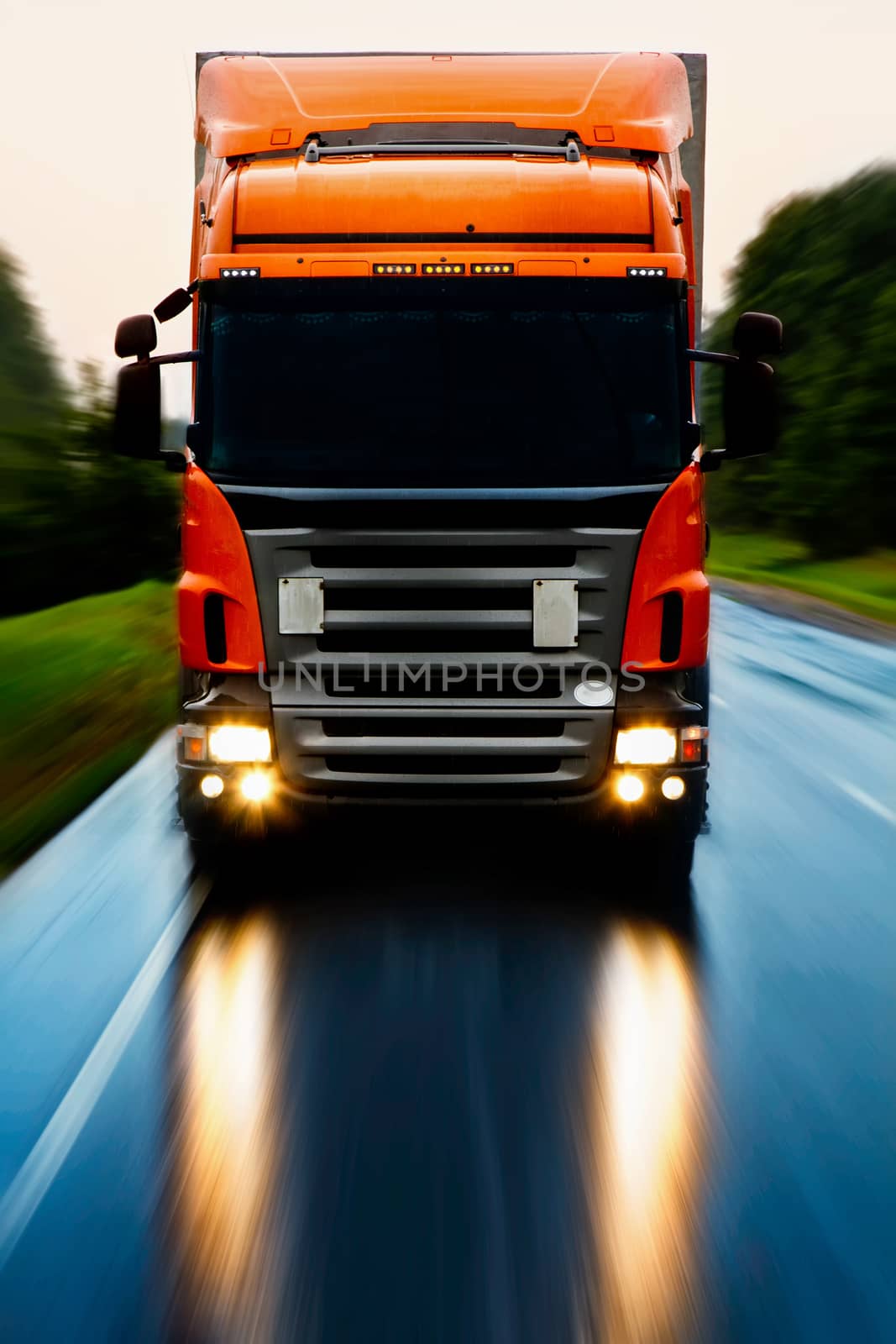 Truck delivery cargo on the highway in motion