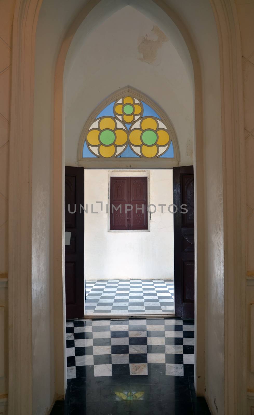 arches passage in a hall by siraanamwong