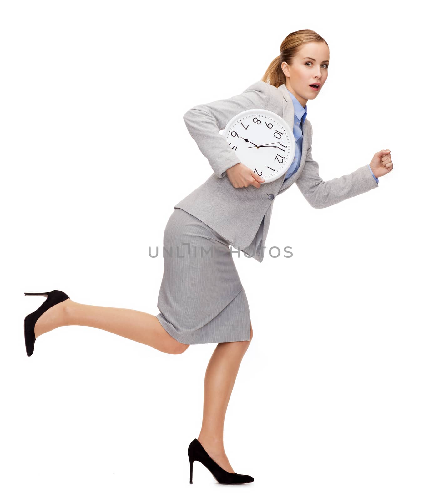 stressed young businesswoman with clock running by dolgachov
