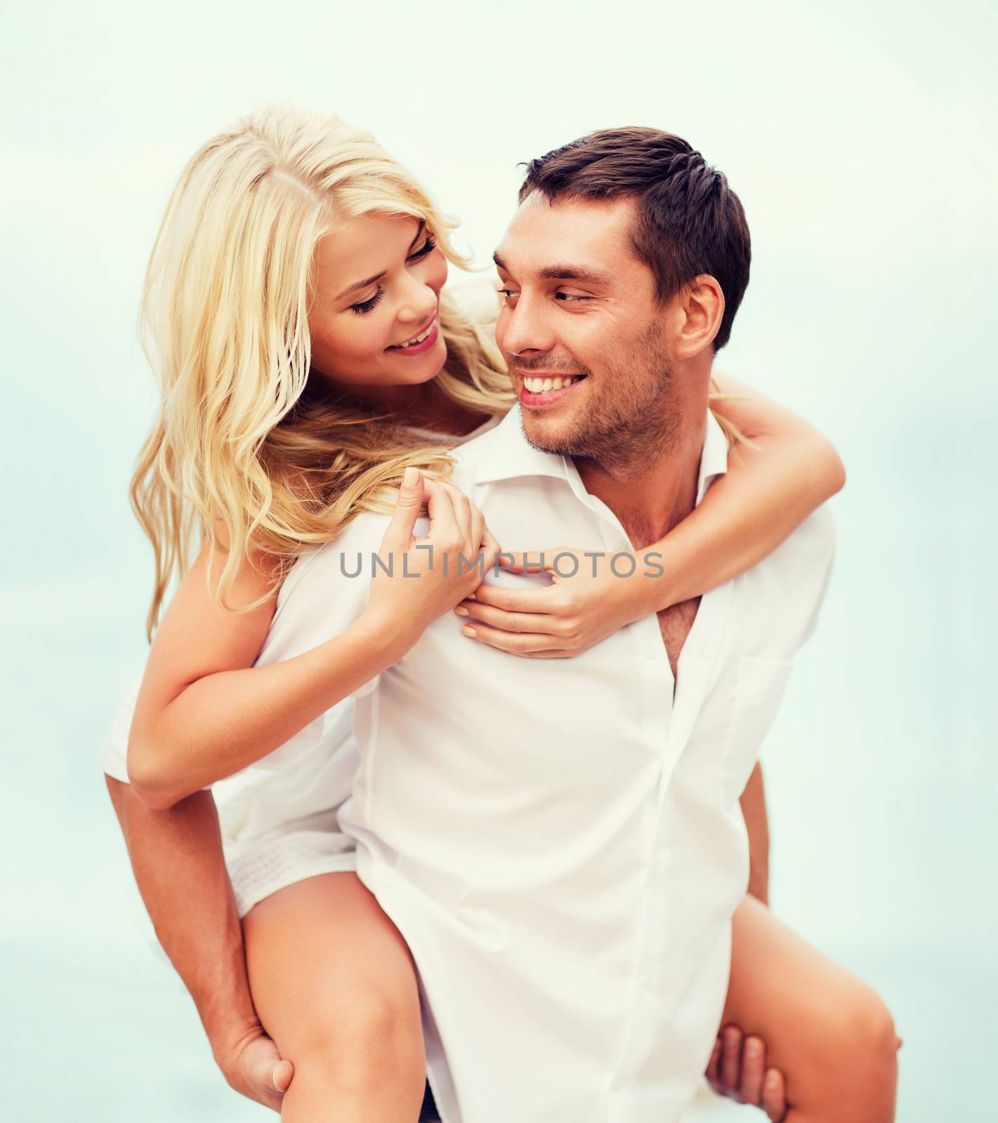 summer holidays, celebration and dating concept - couple at seaside