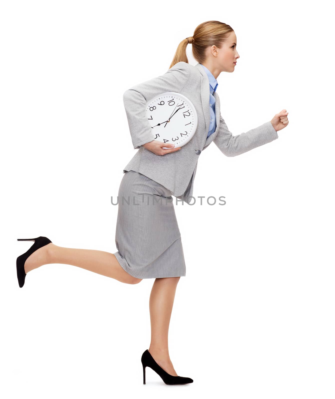 calm young businesswoman with clock running by dolgachov