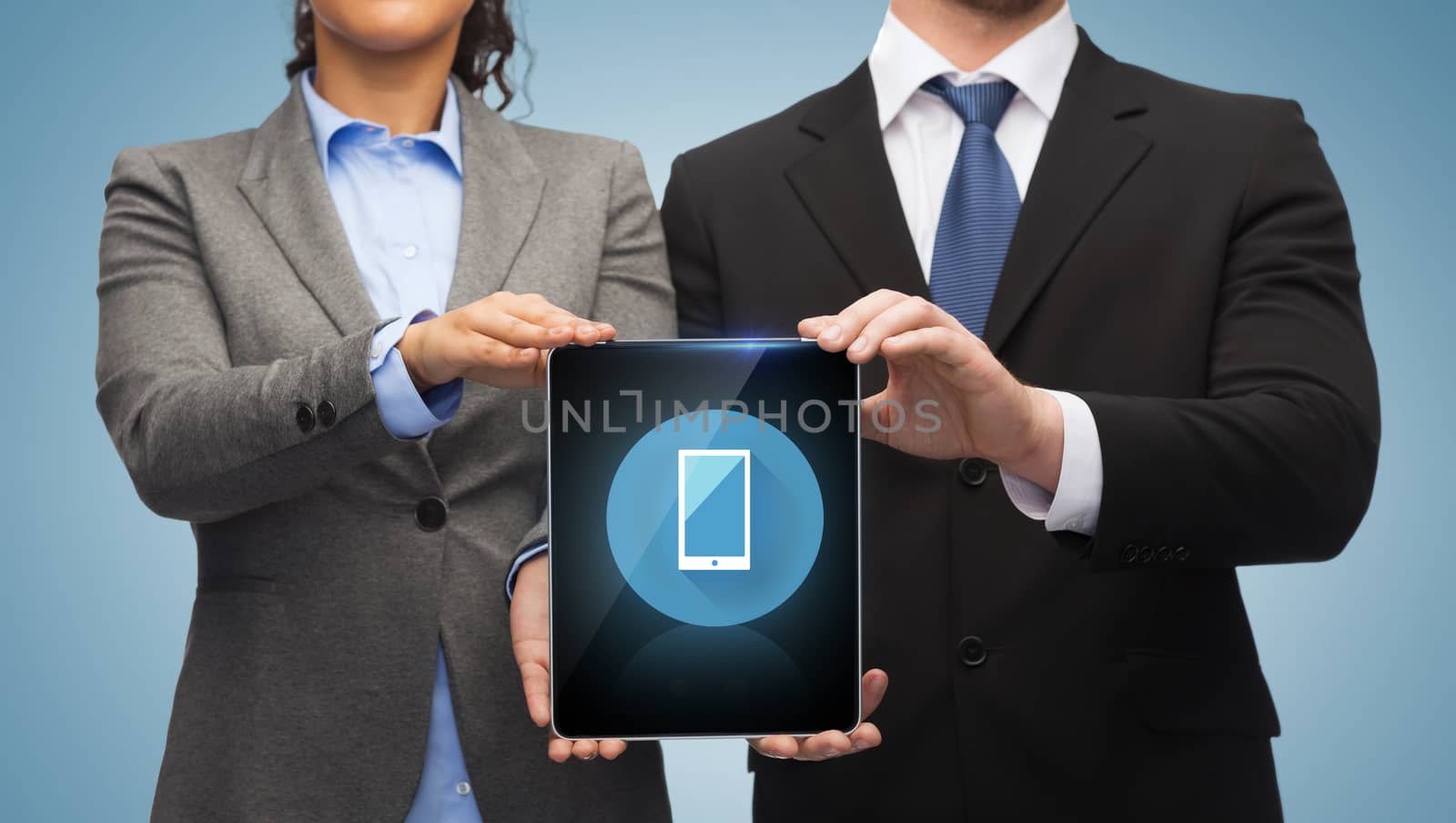 business, technology and internet concept - businessman and businesswoman with blank black tablet pc screen