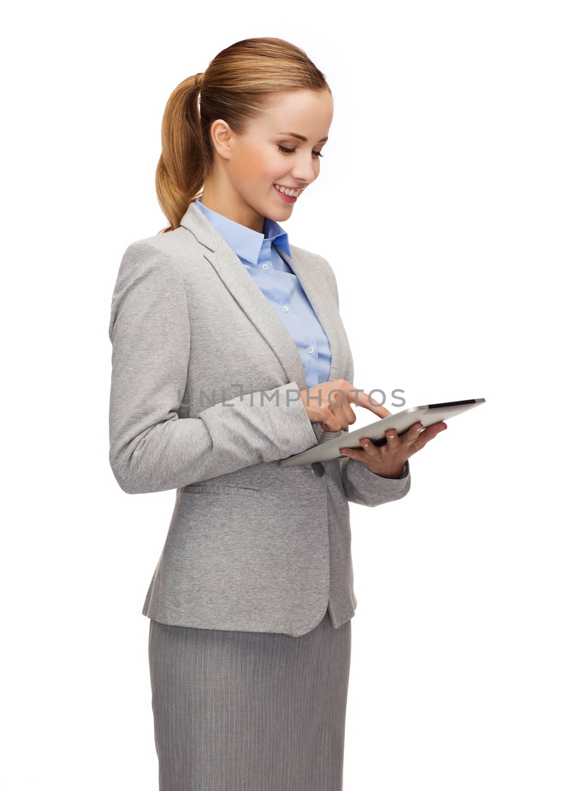 business, internet and technology concept - smiling woman looking at tablet pc computer