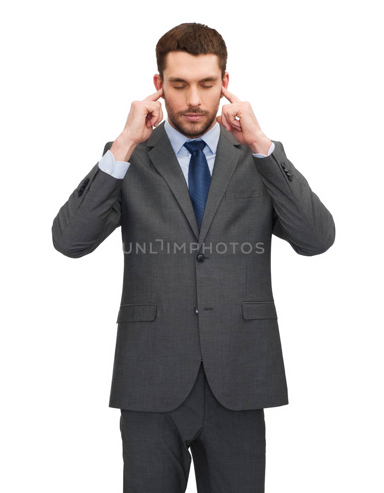 annoyed businessman covering ears with his hands by dolgachov