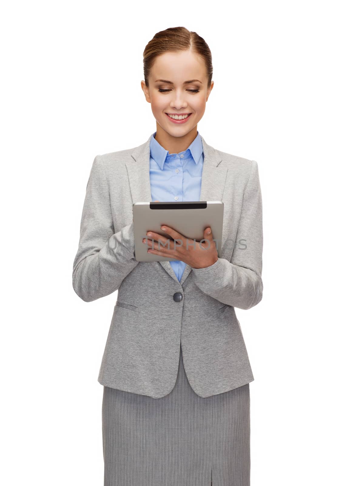 business, internet and technology concept - smiling woman looking at tablet pc computer