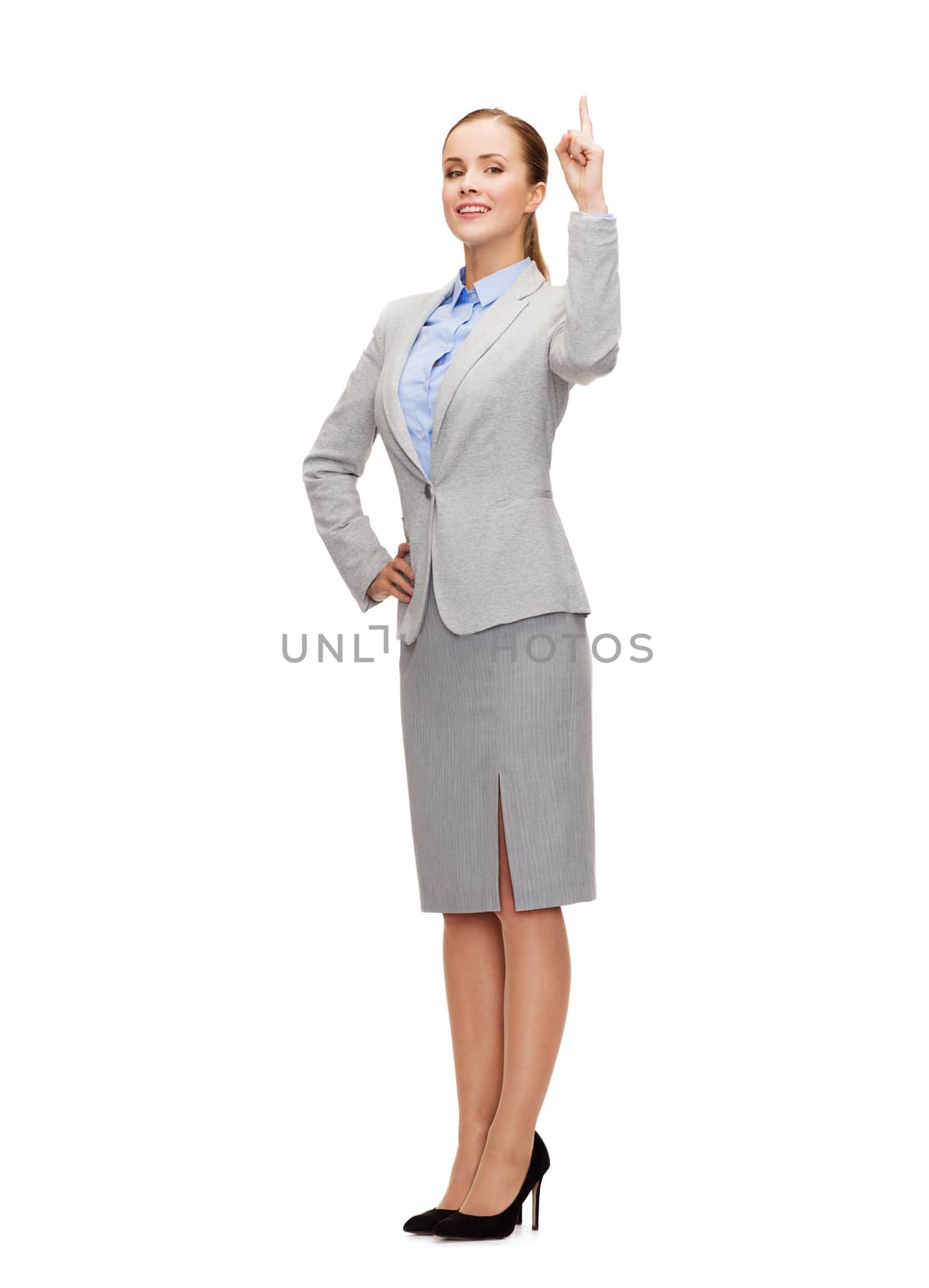 smiling businesswoman with her finger up by dolgachov