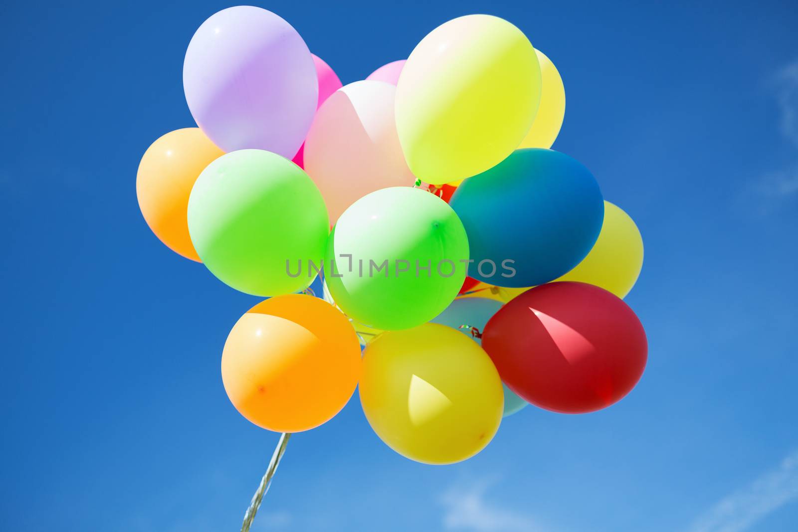 lots of colorful balloons in the sky by dolgachov