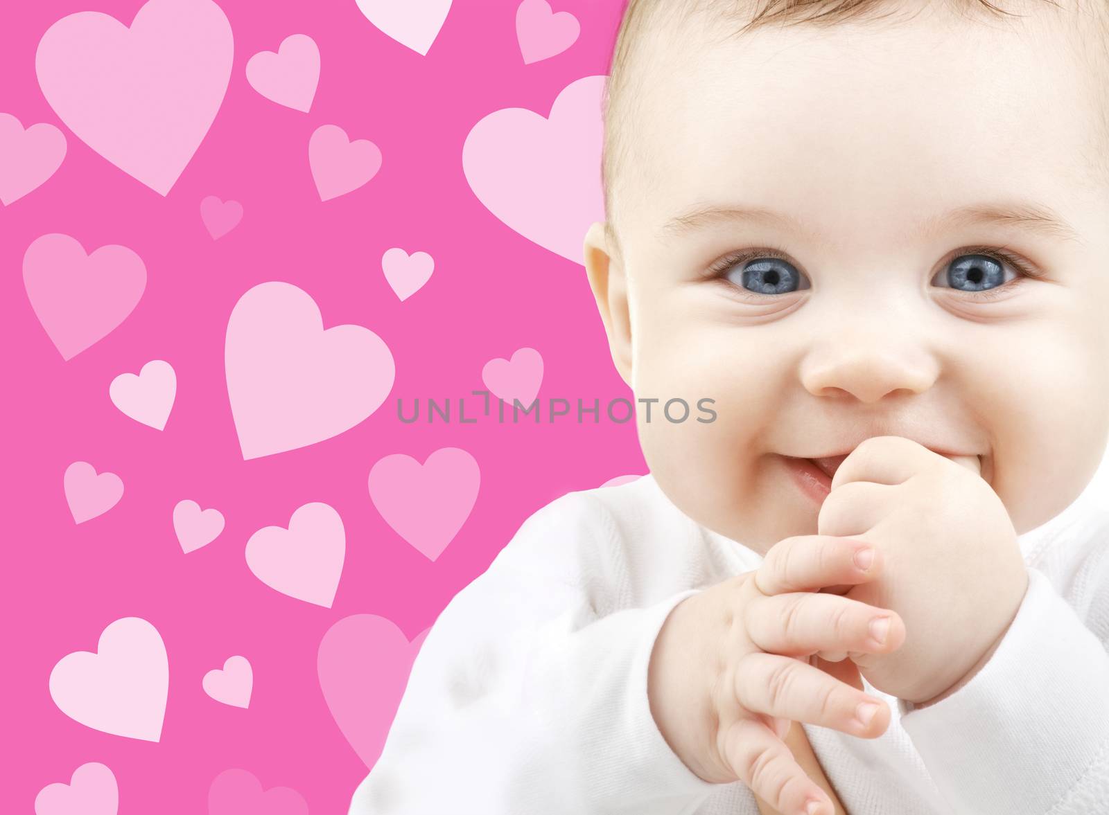 child, people and happiness concept - adorable baby
